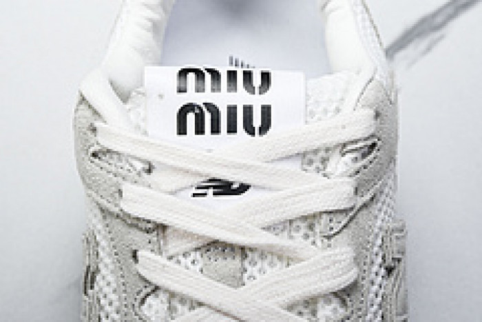 New Balance Mi­u