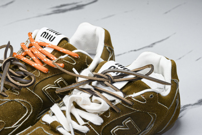 New Balance Mi­u